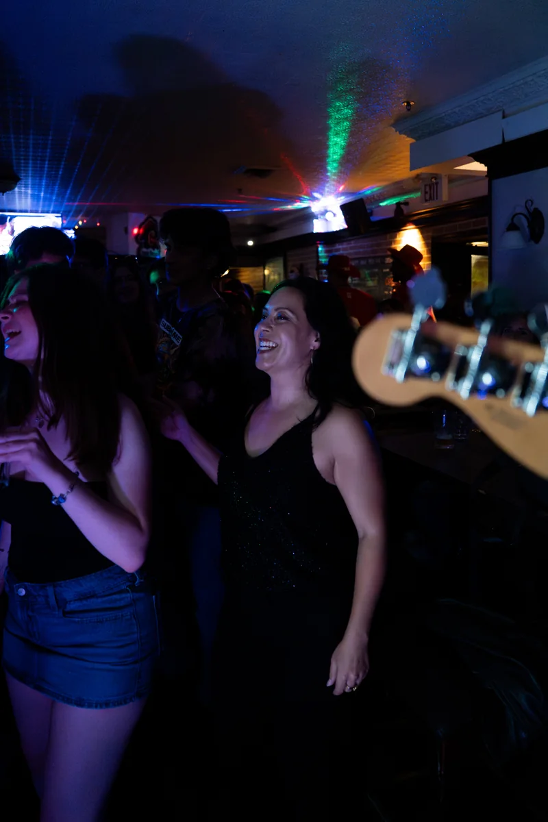 Friends enjoying a lively night at The Dickens