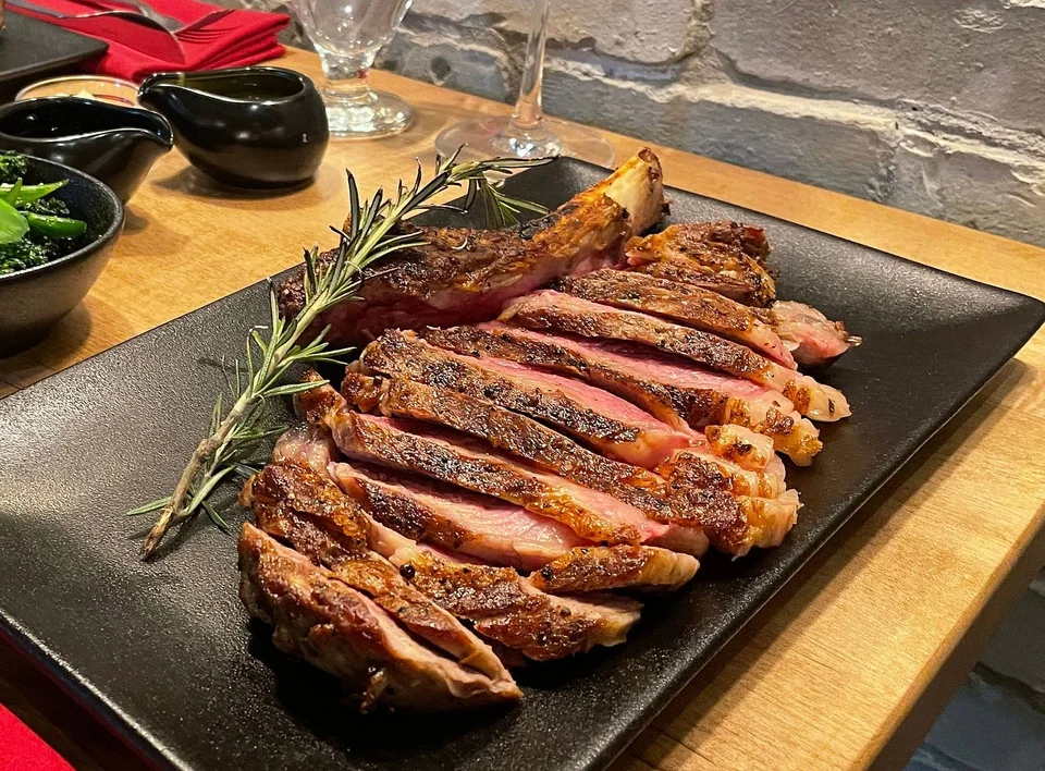 Sliced steak at Prime Steak + Raw Bar