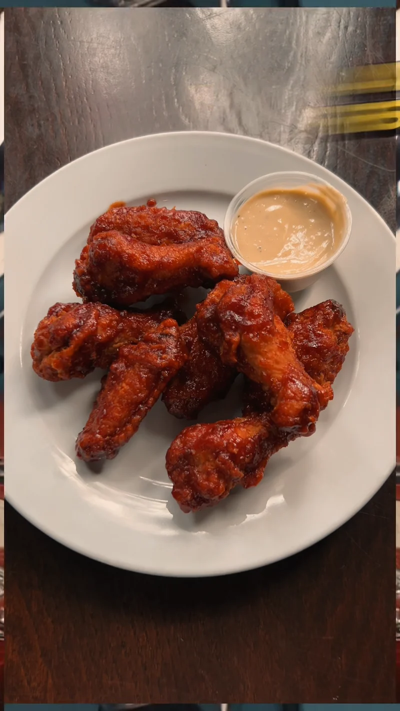 Wings photographed in B Social’s 2026 Super Bowl campaign